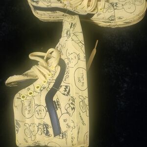 Vans Cartoon Print Sneakers in Yellow and Black